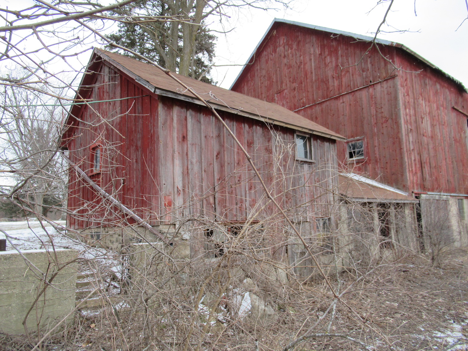 A red dairy barn that was on a farm in Dexter, Michigan