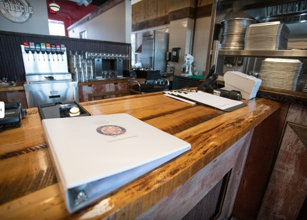 One of the custom, reclaimed barn wood countertops at Dr. Rolf's Barbeque