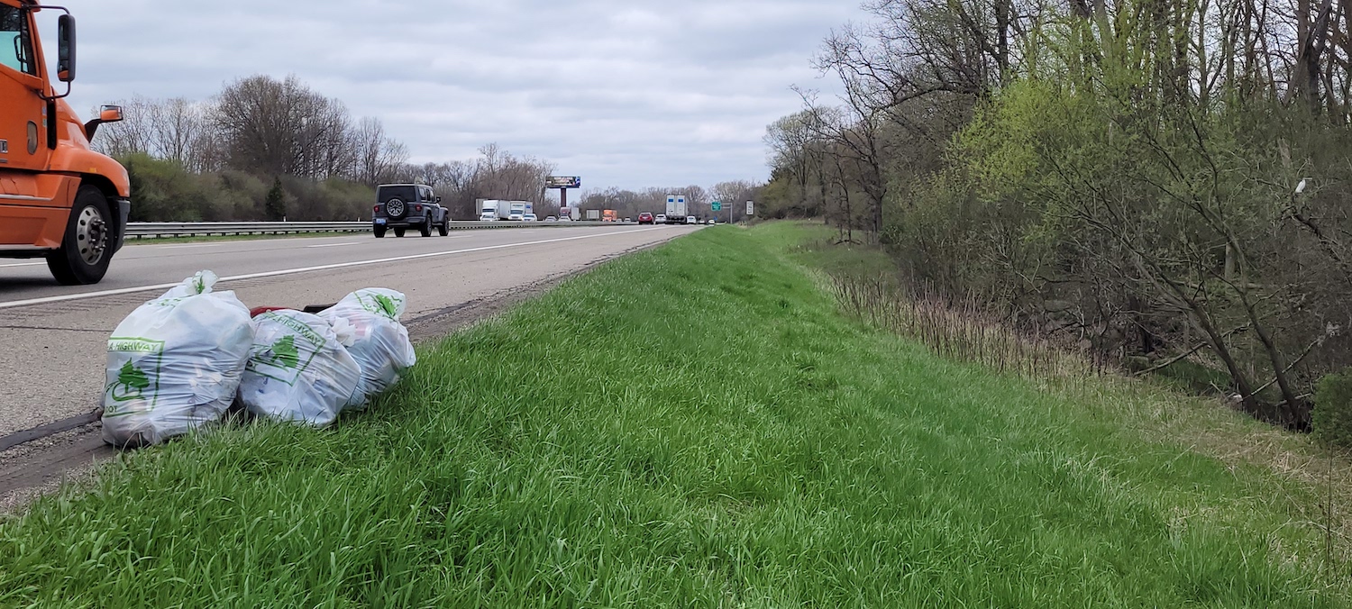 Two bags of trash collected from the Michigan Reclaimed Barns and Lumber trash pick up