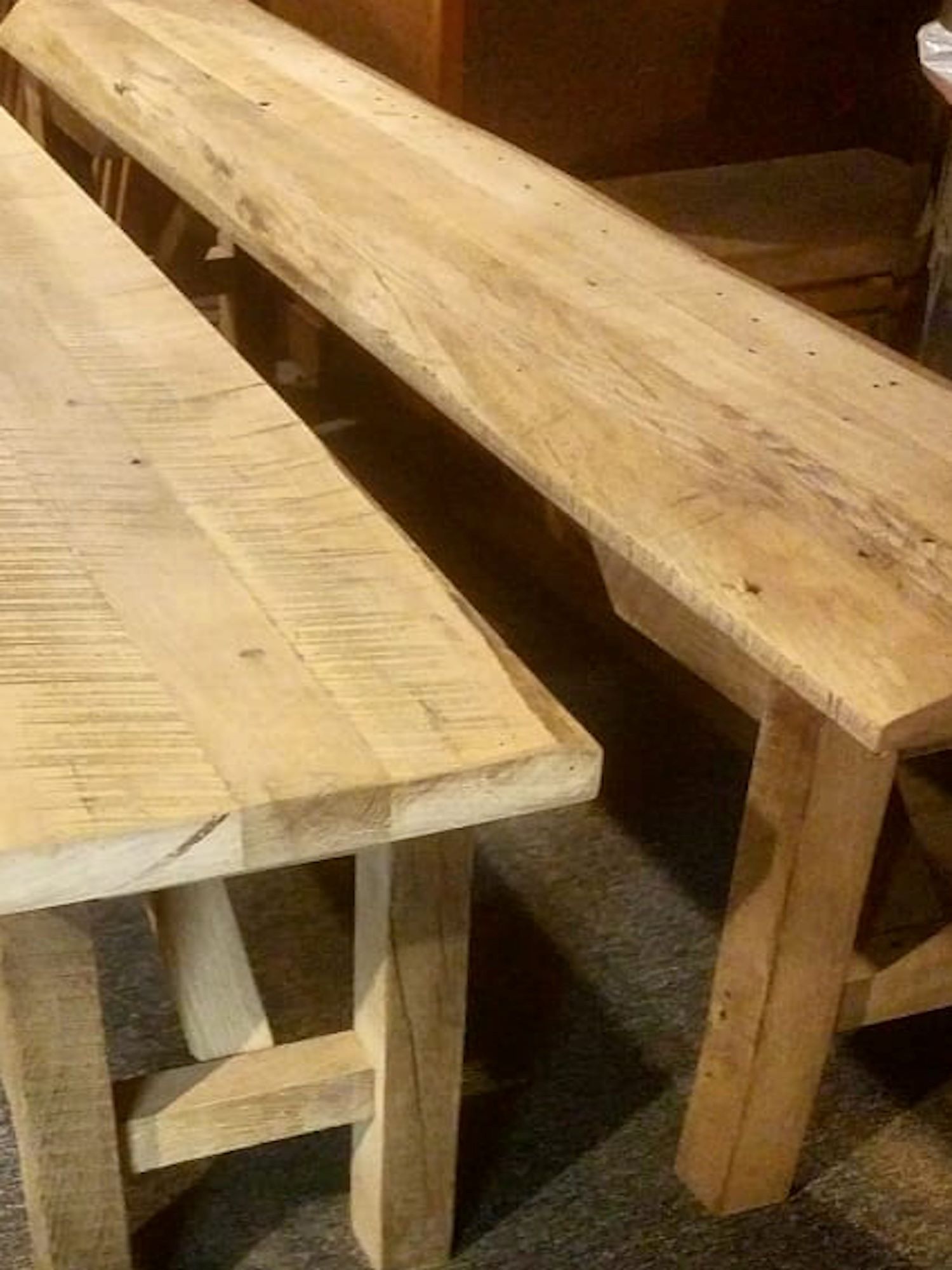 Two barnwood benches without a wood stain