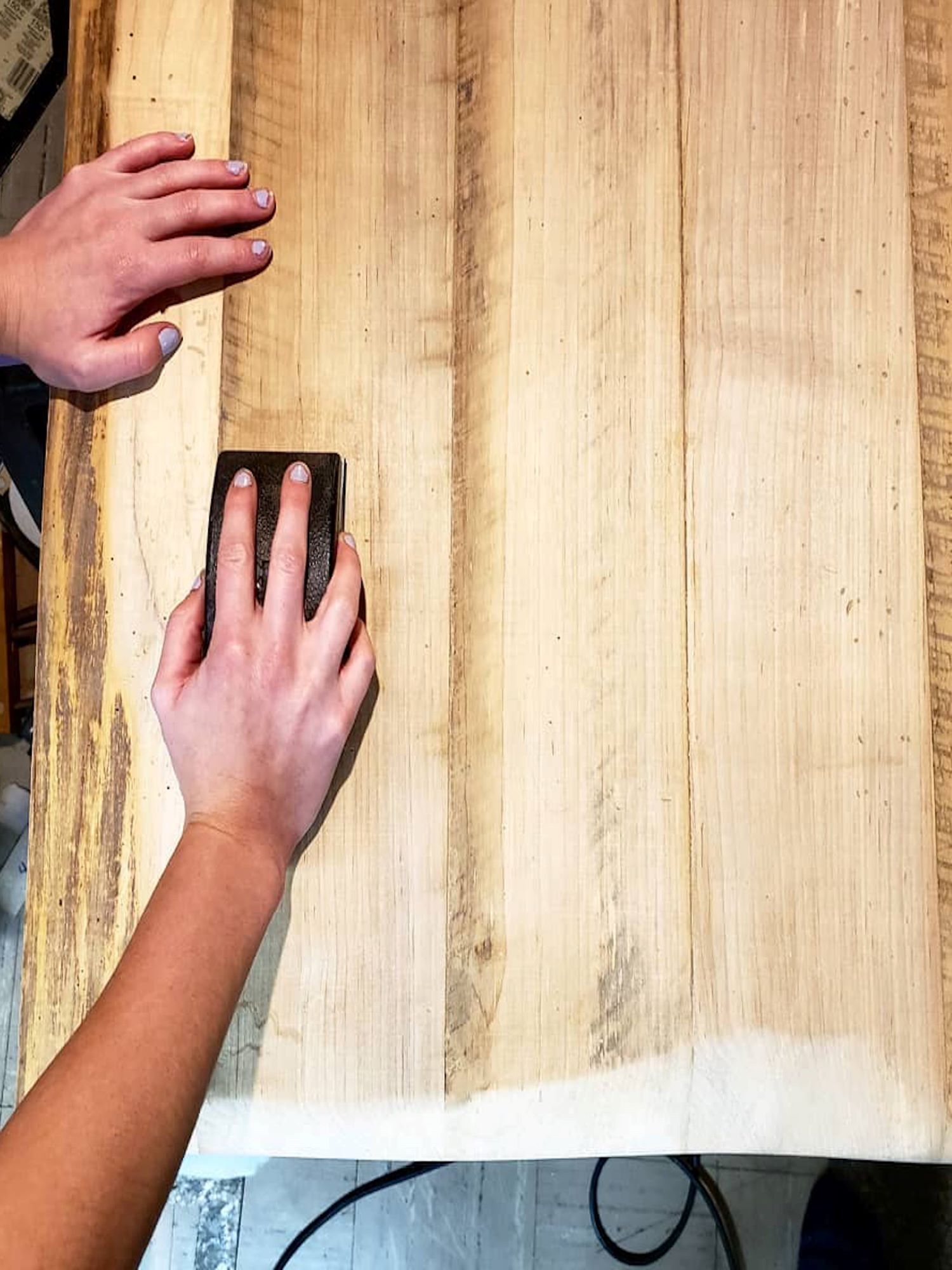 Hand sanding a one-of-a-kind countertop