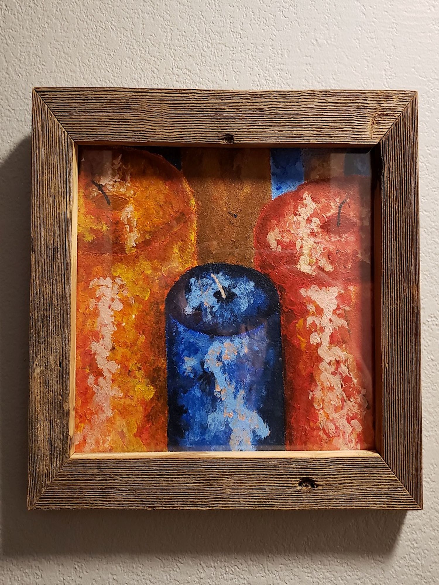 Painting of candles in a reclaimed barnwood frame