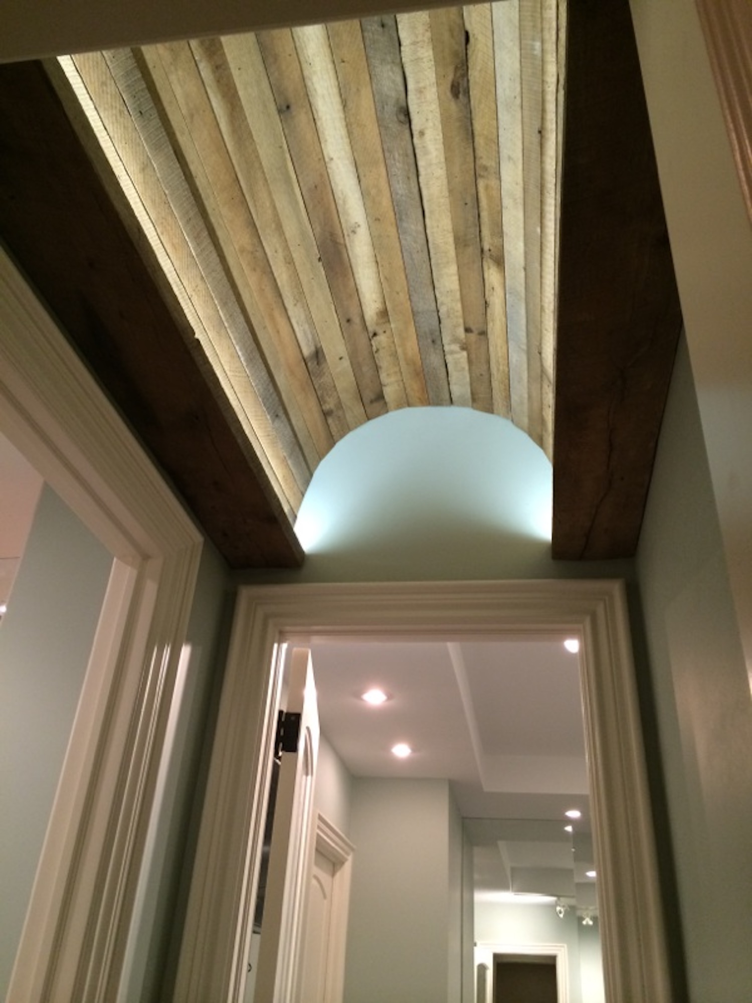 A barnwood ceiling in a customer's home