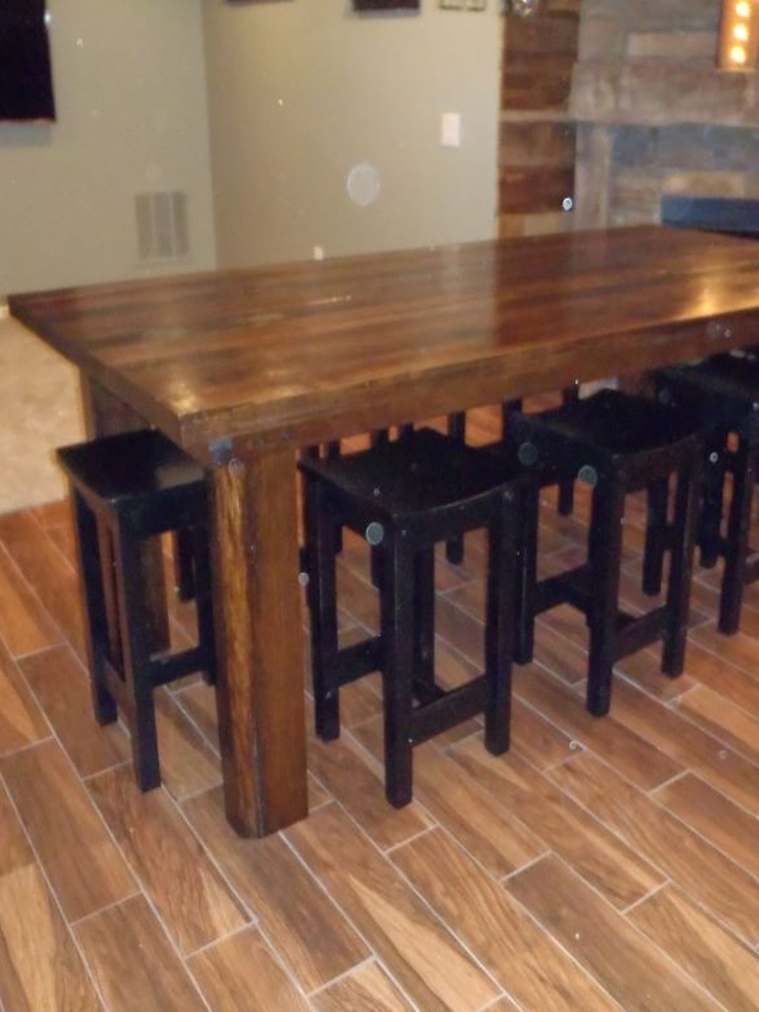 A handcrafted barnwood table in a customer's kitchen
