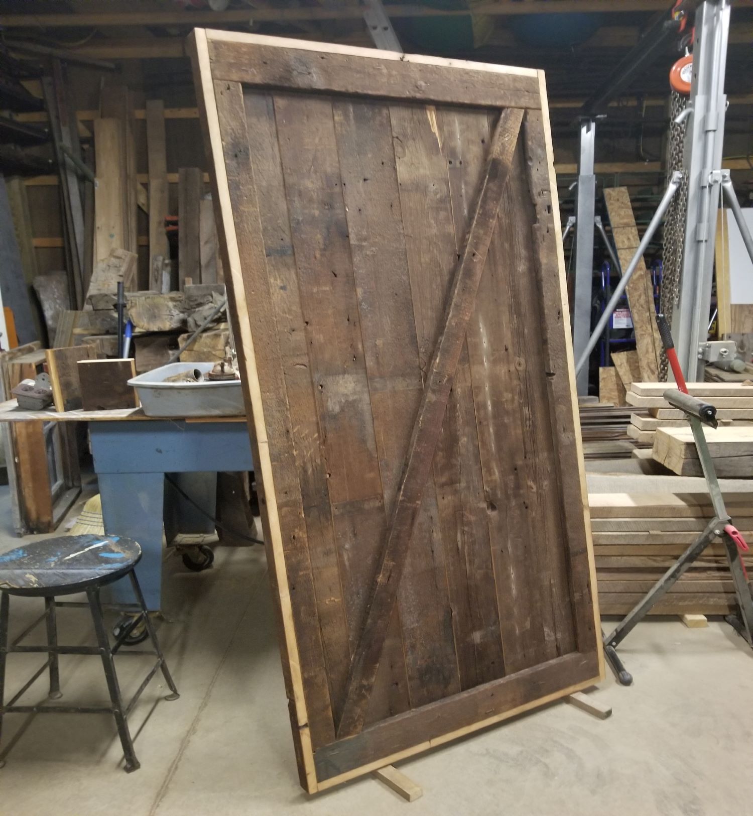 Custom made Michigan reclaimed barn wood sliding door