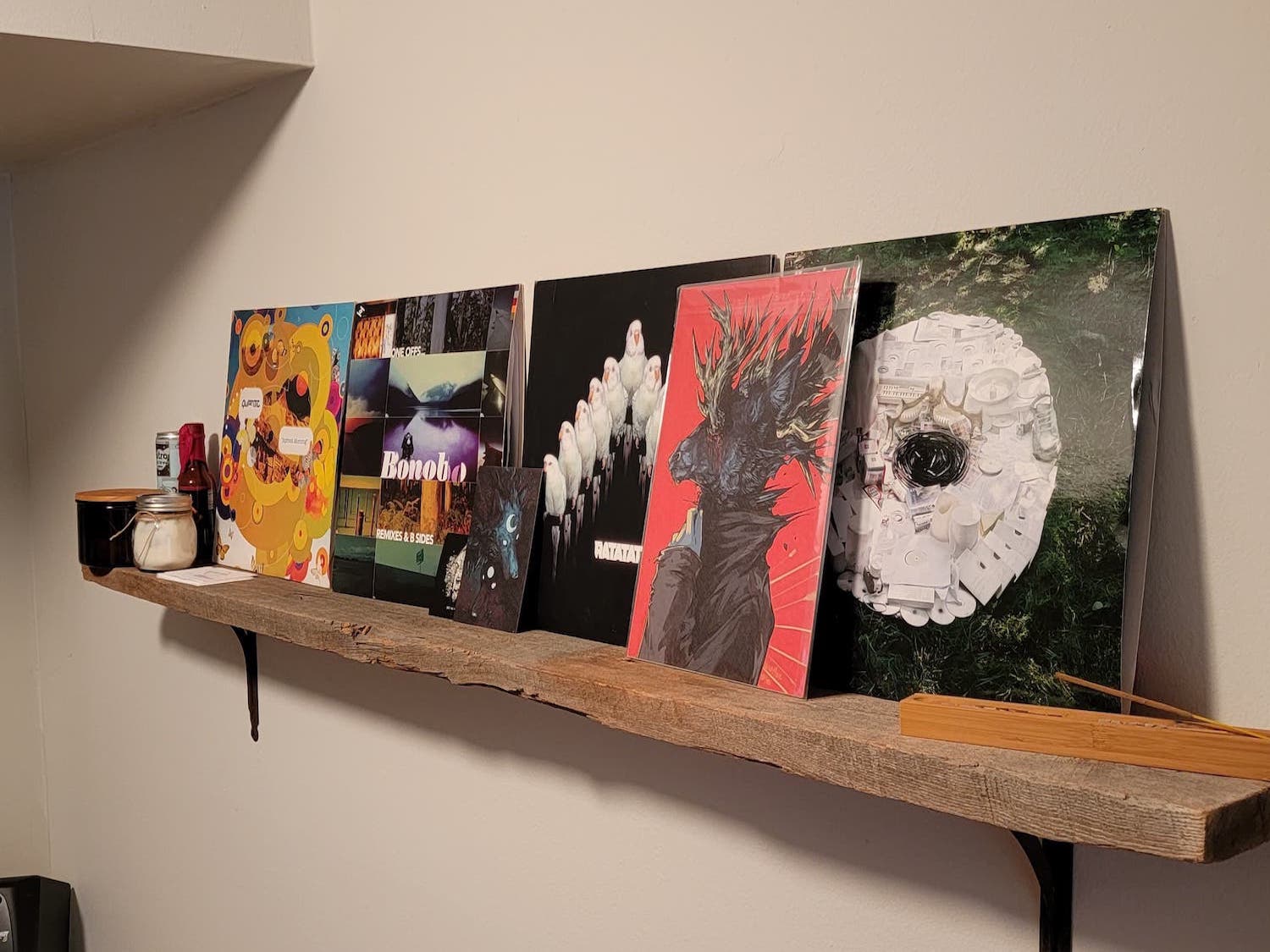 A reclaimed barnwood shelf installed in a customer's home