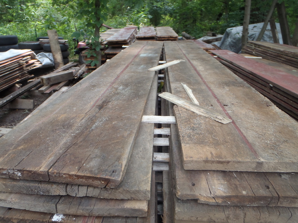 Brown boards stacked at our warehouse