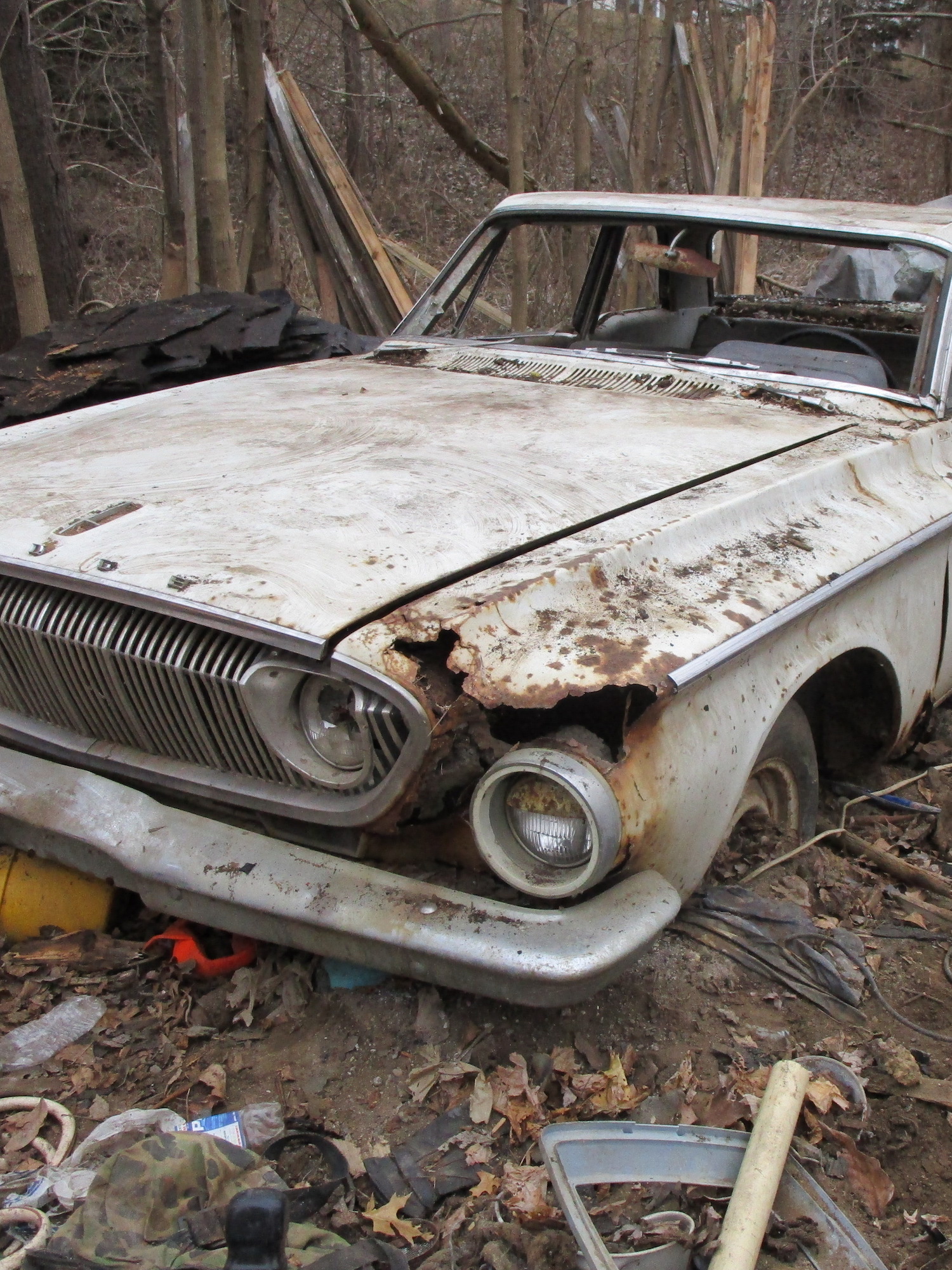 A white 1962 Dodge found at a barn demolition site in Michigan