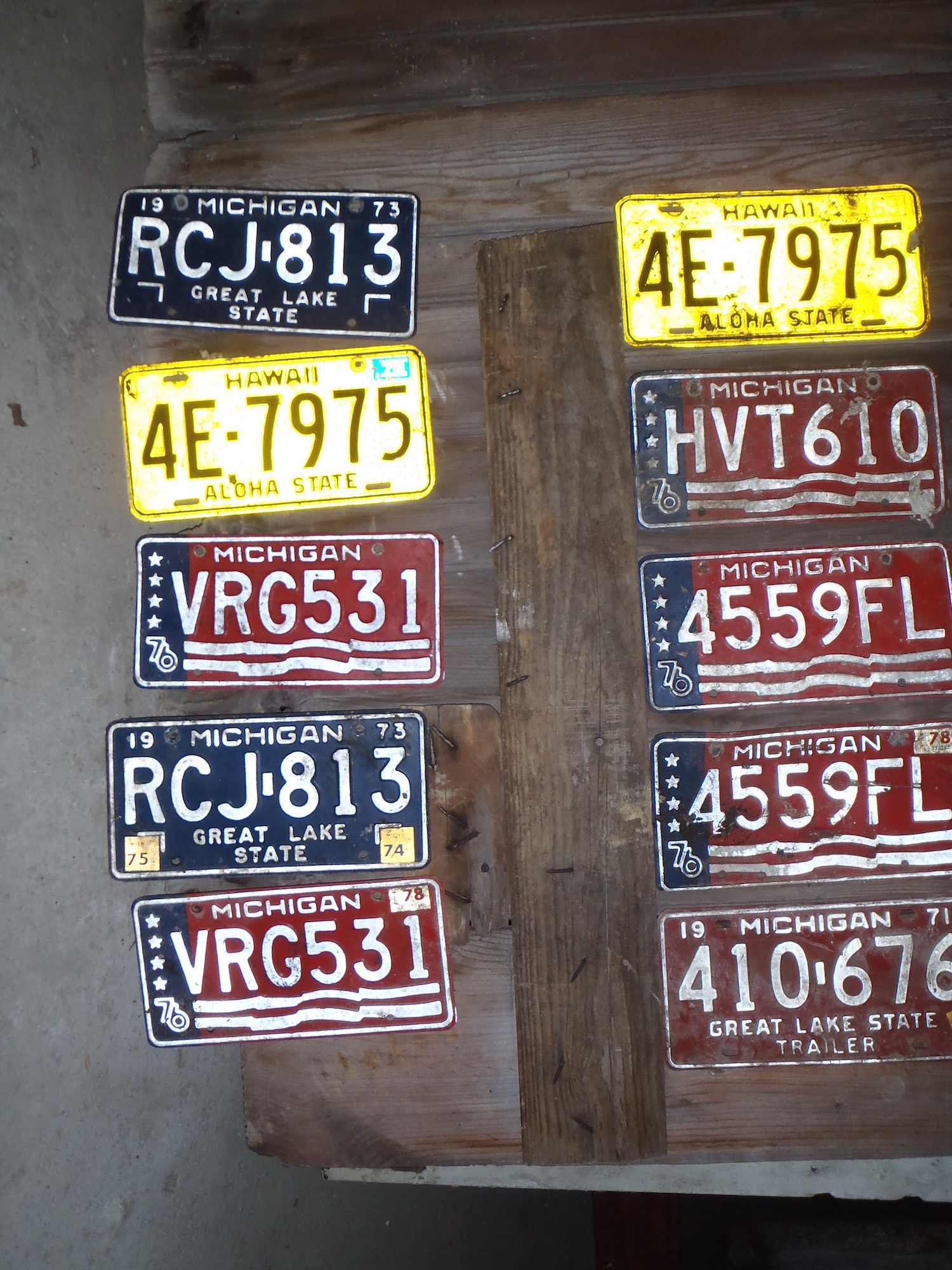 Various license plates found at barn sites