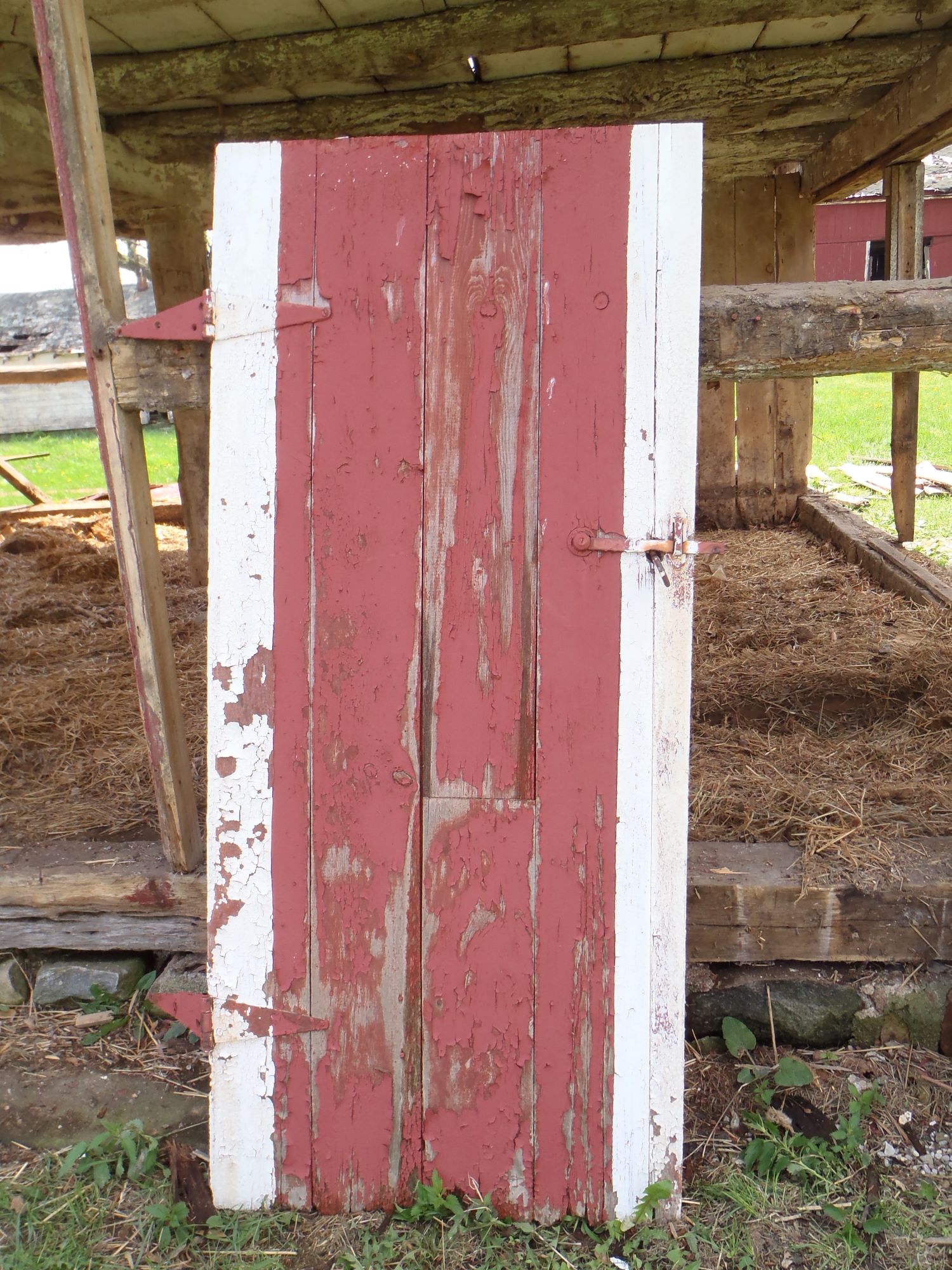 red and white swing door from a barn in Chelsea, MI